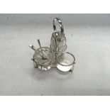 Silver hall marked salt and pepper shakers and a mustard spoon