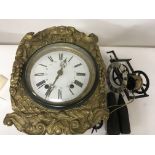 A Continental metal cased wall clock and one other