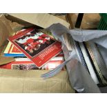 A collection of vintage Arsenal Football programmes and assorted books