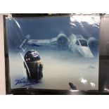 An extensive collection of six Star Wars binders containing autographed photographic prints of