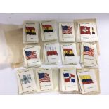 A collection of Kensitas silk cigarette cards. NO
