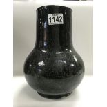 A Chinese drip glaze bulbous vase in mottled colou