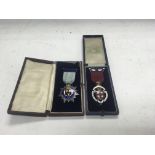 2 hallmarked silver and enamelled Masonic medals , both cased