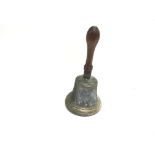 A vintage large brass handbell.