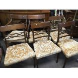 Six inlaid mahogany dining chairs comprising two c