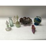 A collection of glass pieces including bowls, vases and small decanters.