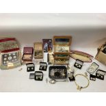 An assorted collection of costume jewellery and co