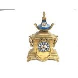 A French gilt and porcelain mantel clock. No reser