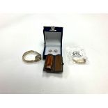 A boxed amber cheroot holder with 9ct band, ladies 9ct gold wristwatch and a pair of cameo