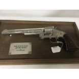 A Franklin mint model of the Wyatt Earp .44 revolv