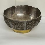 A heavy white metal eastern bowl with pierced panel decoration, 18.5cm diameter x 9cm.