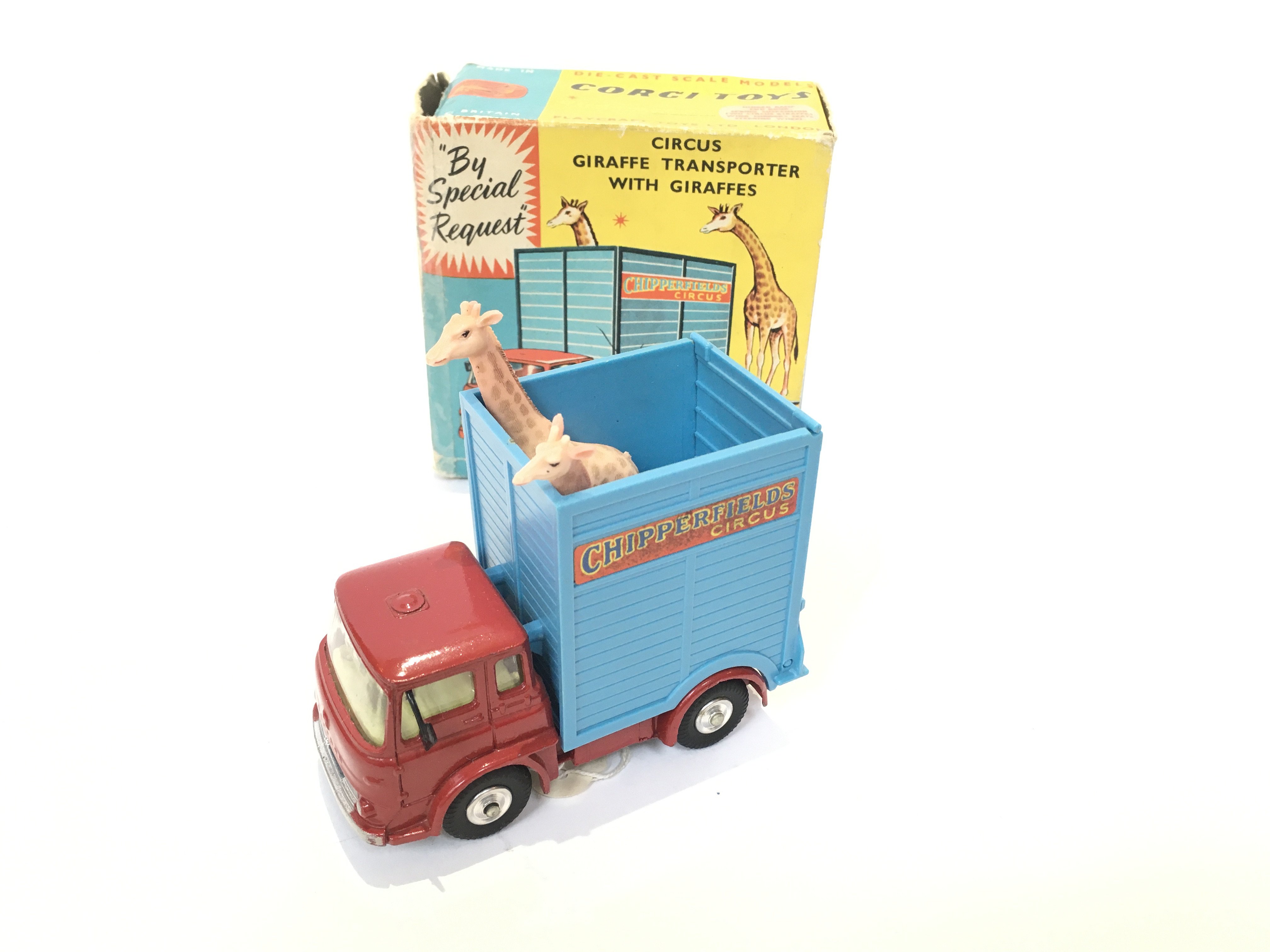 A Boxed Corgi Circus Giraffe Transporter With Gira