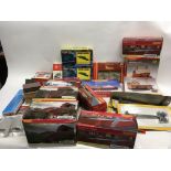 A collection of boxed model railway accessories in