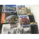 A collection of model railway accessories includin