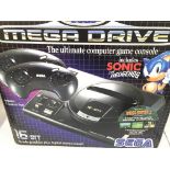 A Boxed Sega Mega Drive with 3 Games.