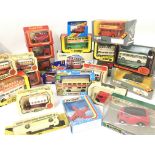 A Collection of Boxed Die-Cast Buses and Vans etc.