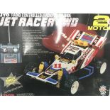 A Boxed Taino Radio Controlled Jet Racer 4WD.