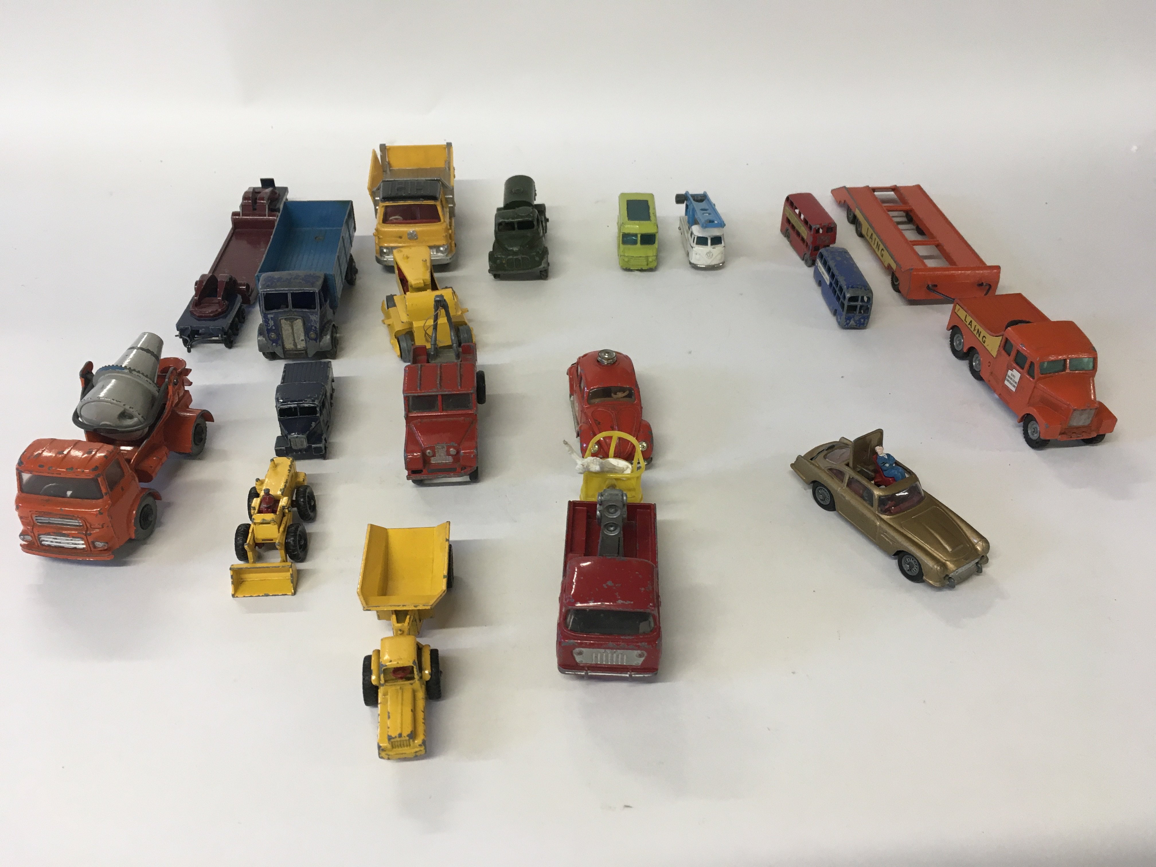 A collection of Playworn 18 diecast model vehicles by Matchbox..corgi..Husky. Includes golden