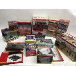 A collection of boxed model railway buildings, mai