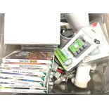 A Box Containing A Nintendo Wii With a Collection