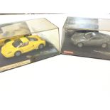 2 Boxed Carrera Evolution Slot Cars. A Enzo Ferrar