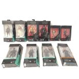 A collection of Star Wars black series figures and