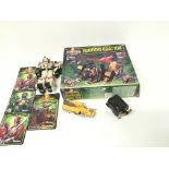 A collection of power ranger items including an or
