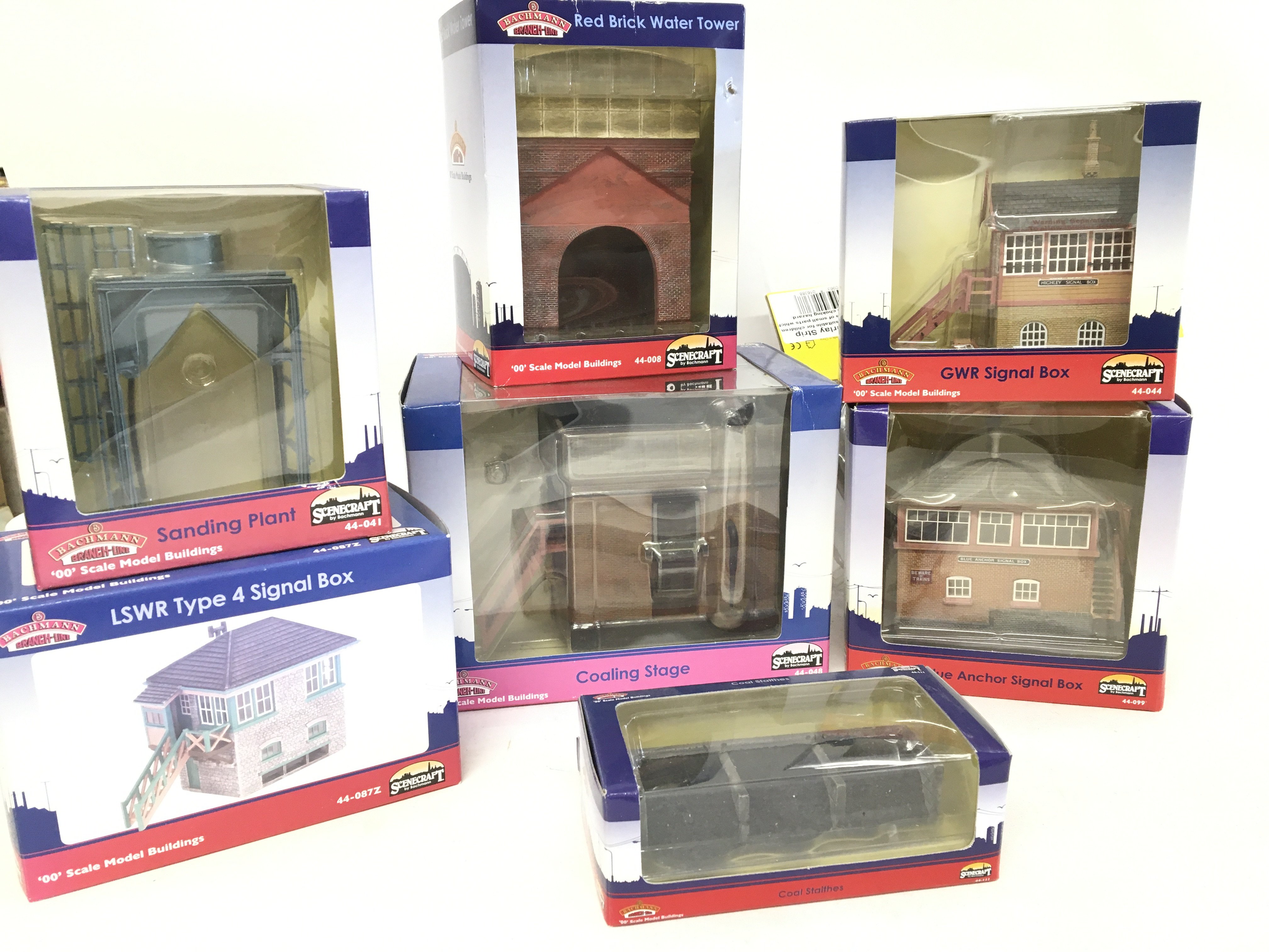 A Box Containing Boxed Bachmann 00 Gauge Buildings Etc.