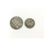 A 1780 Austrian coin and an 1883 GB coin (2).