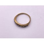 9ct gold 7 stone diamond ring 1/2 loop. Size N, 2.