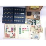 A collection of coins, bank notes, stamps and firs