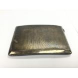 A silver cigarette case, Birmingham hallmarks.