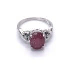 18ct White Gold Ruby Ring with Diamond Shoulders.