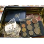 A tin containing coinage and bank notes including