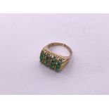 9ct Gold 16 stone emerald ring (broken shank). Siz