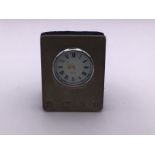 A small hallmarked silver clock