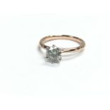 A certificated 18ct white and rose gold RBC diamon