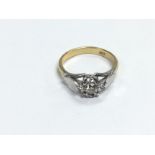 An 18ct gold and solitaire diamond ring, approx 3.