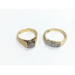 Two 18ct gold rings set with diamknds, approx tota