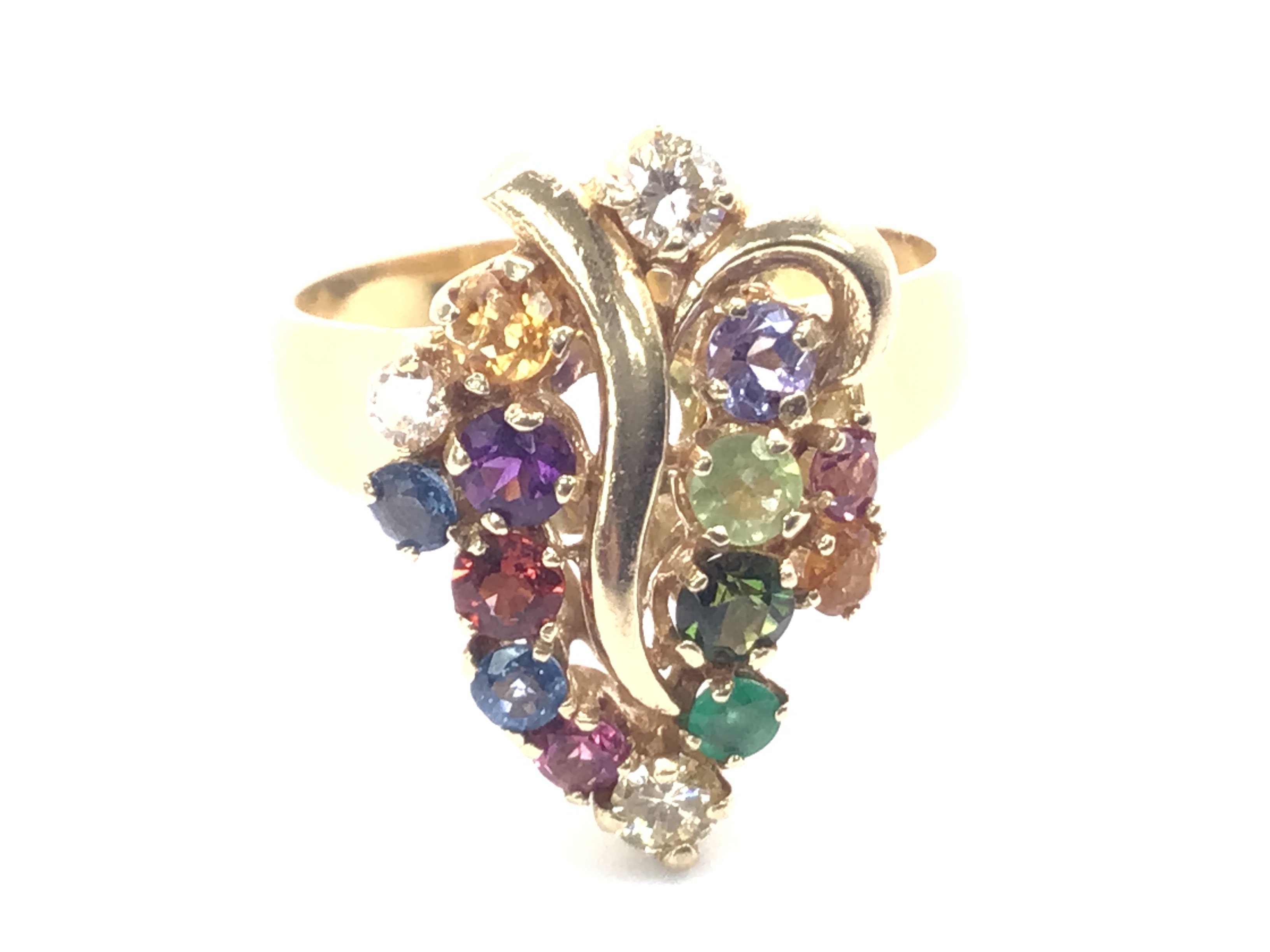 A 18Ct Gold Multi-Stone Cluster Ring. 8.3 Gm size