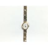 A Rotary 9ct gold cased ladies watch on a gold str