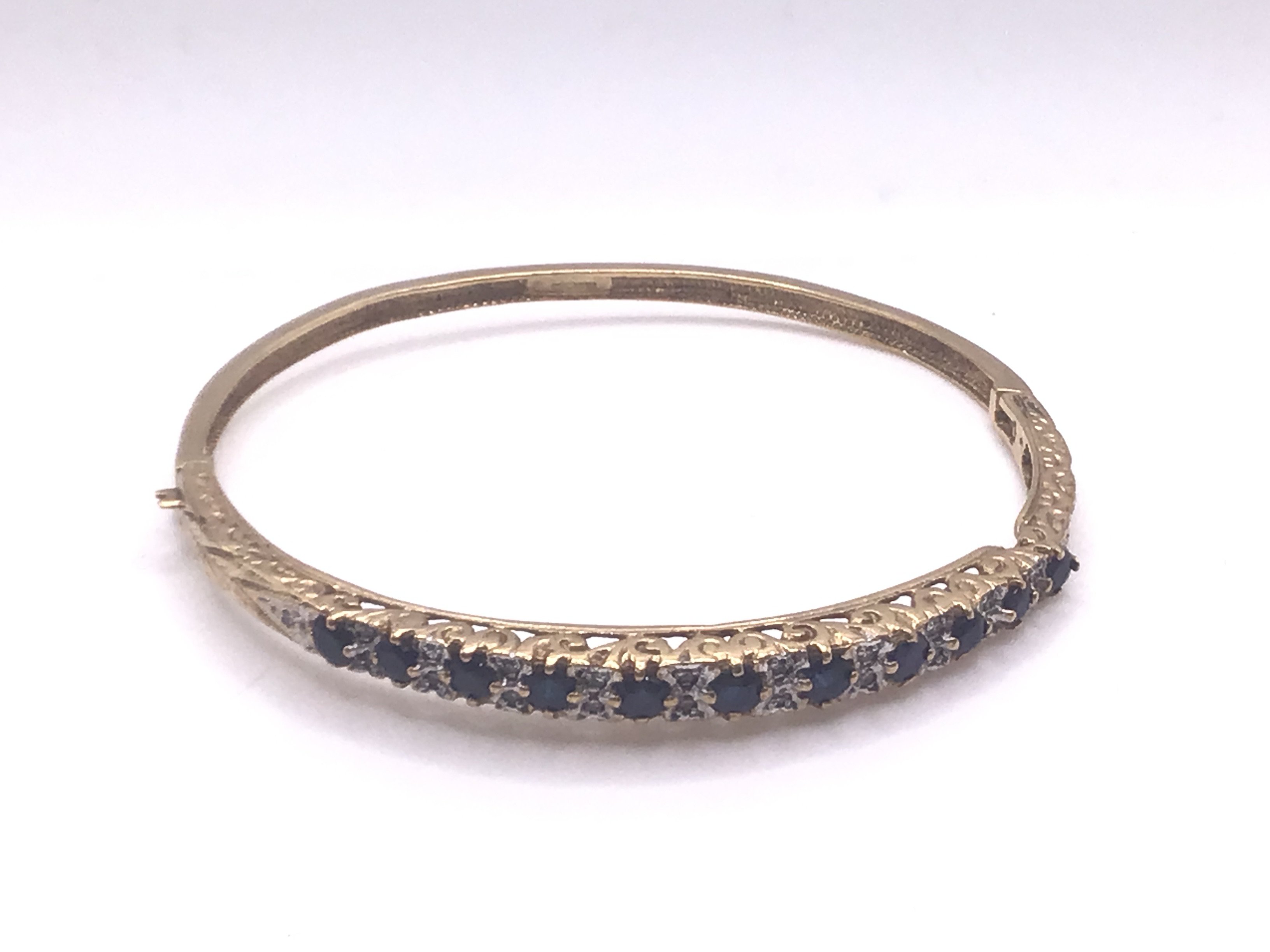 9ct gold sapphire/diamond bangle, approx 12.6g (A)
