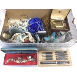 A box of costume jewellery.