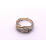 A 9ct gold and diamond set gents ring, approximate