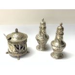 A continental silver mustard pot with cherub and w