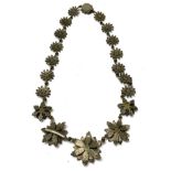 A 19thC steel cut flower design necklace.