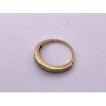 18ct gold 9 stone diamond 1/2 loop ring. Size P, 3