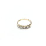 A 9ct gold ring set with opals and diamonds, appro