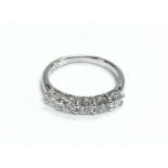 An 18ct white gold five stone diamond ring, RBC di