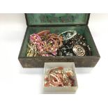 A box of costume jewellery and a collection of cor